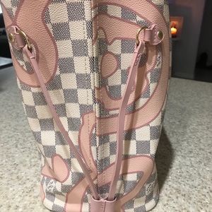 Grey and white checkered bag